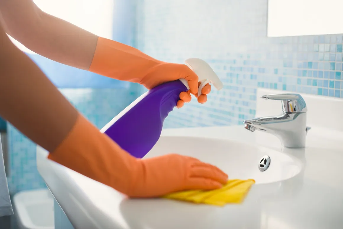 Cleaning and disinfecting bathroom sink and surfaces